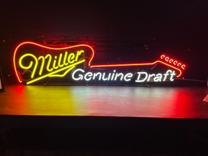 lot 15 image: Miller Genuine Draft, MGD guitar neon sign, NOS