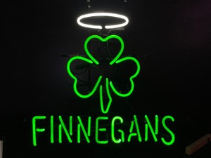 lot 16 image: Finnegans neon sign with shamrock and halo, NOS