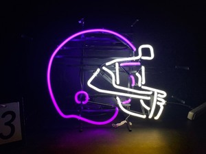 lot 23 image: Purple and white neon football helmet