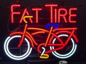 lot 27 image: Fat Tire neon bike