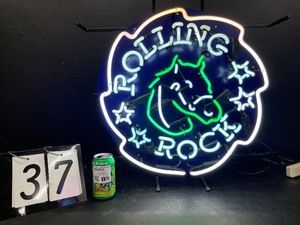 lot 37 image: Rolling Rock saw blade neon with horse