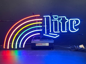 lot 43 image: Miller Lite rainbow neon sign