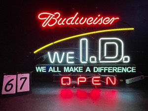 lot 67 image: Budweiser We ID  Open, neon sign