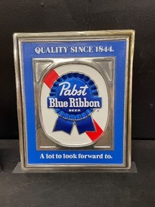 lot 93 image: Pabst Blue Ribbon PBR, Vintage P-1962 silver metallic cardboard sign, NOS