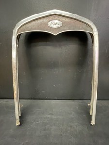 lot 118 image: Ford radiator cover, Original 1930 Model A
