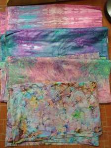 lot 11 image: Four BatikWatercolorTie Dye Cotton Materials 4 Yards Each