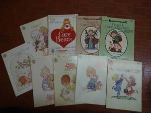 lot 13 image: Precious Moments, Hummel & CareBears Crosstitch Patterns