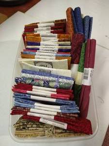 lot 16 image: Over 50 New Fat Quarters