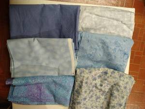 lot 30 image: Six Blue Cotton Materials