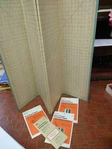 lot 35 image: Large Folding Measuring Mat &Four Dritz Tracing Mark-Be-Gone Papers