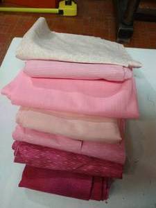 lot 37 image: Seven Large Cuts of Pink Materials, 3-4 Yards Each