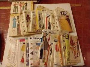 lot 66 image: Fun Vintage Sewing Patterns Wedding Dress, Childrens Costumes, Etc