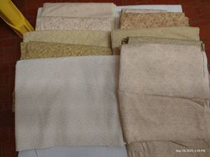 lot 112 image: Ten Creamy Neutral Cotton Fabrics, 2 Yards Each
