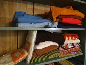 lot 147 image: Two Shelves Vintage Knit Garment Fabrics & T-Shirt Kits