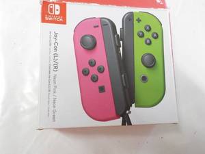 lot 28 image: Joy-Can Nintendo Switch...
