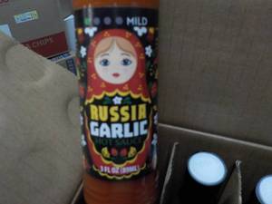 lot 142 image: Case of 36 Russia Garlic 3 oz Bottl...