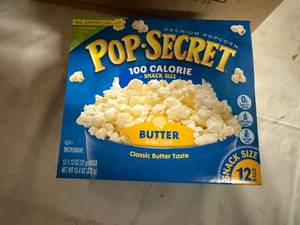 lot 97 image: 12 Pack of Pop Secret Popcorn