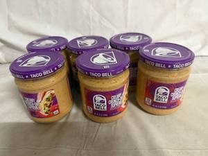 lot 208 image: 6 Jars of Taco Bell Creamy Crunch-Dip Supreme Cravings Dip