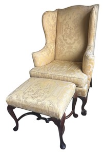 lot 42 image: Wingback Armchair with Matching Ottoman and Carved Wood Legs