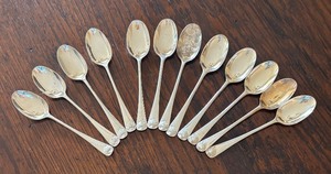 lot 24 image: Twelve Sterling Silver Williamsburg Steiff Demitasse Spoons