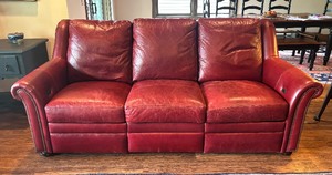 lot 8 image: Stylish Red Leather Reclining Sofa  Couch with Rivet Details