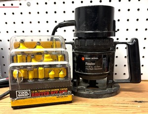 lot 65 image: Tool Shop 12 Piece Tungsten Carbide Tipped Rotary Bit Set with Black and Decker 7600 Router