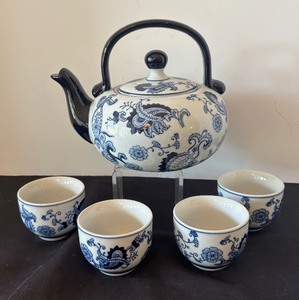 lot 113 image: Pier 1 Blue and White Porcelain Teapot with 4 Matching Cups