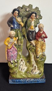 lot 119 image: Staffordshire Style Vintage Traveling Musicians Ceramic Figurine