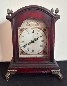 lot 141 image: Vintage Style Wooden Mantel Clock with Ornate Metal Feet