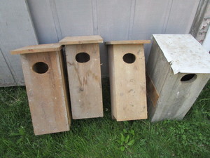 lot 48 image: Wood duck houses, three new, one us...
