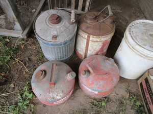 lot 128 image: Vintage fuel cans...