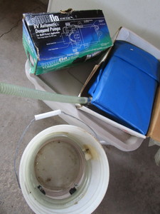 lot 148 image: RV automatic demand pump, hose, fre...
