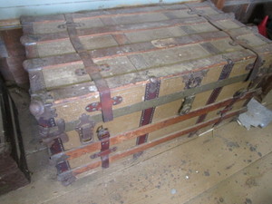lot 185 image: Antique strap trunk, metal corners,...