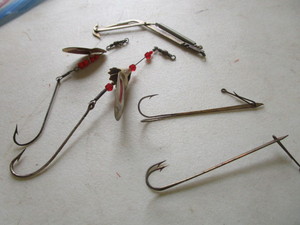 lot 217 image: Antique lures and Spring lever trap...