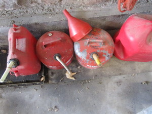lot 236 image: Fuel cans, two metal, two plastic...