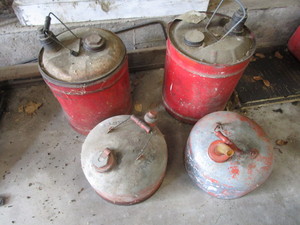 lot 238 image: Fuel cans with vintage...