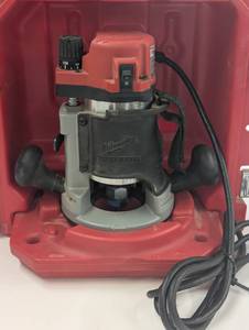 lot 15 image: Milwaukee 1-34 Max HP BodyGrip Router - 5615-29 With Case