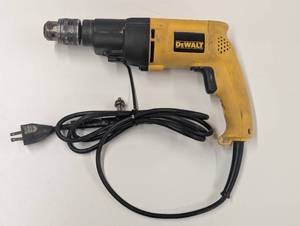 lot 20 image: Dewalt DW505 Hammer Drill 12 with Chuck With Bits and Case