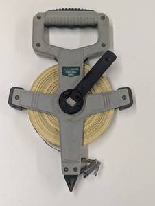 lot 24 image: Master Force Fiber Reel 100 Foot Tape with Comfy Grip Handle