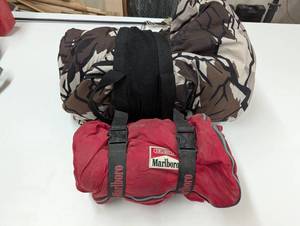 lot 236 image: Set of 2 Sleeping Bags - 1 Camo - 1 Marlboro