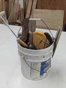 lot 140 image: Full Bucket of Tile, Concrete and Dry Wall Tools