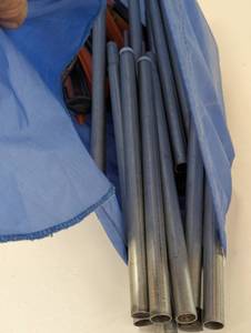 lot 279 image: Bag of 4- 4 foot Poles with Tent Stakes