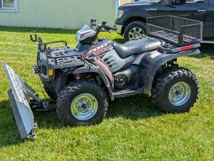 Polaris - 700 Twin Sportsmen - Four Wheeler with KFI Plow and Winch - Comes with Chains and accessories