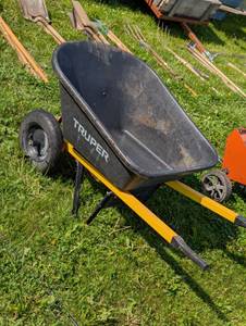 lot 331 image: Truper Dual Wheel Wheelbarrow - Metal Handles - Poly Tub