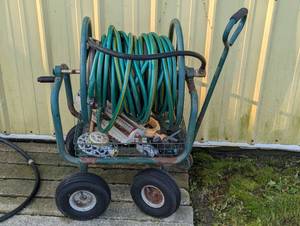 lot 305 image: Large Hose Reel Wagon With Several Hoses and Sprinklers - Pulls Great