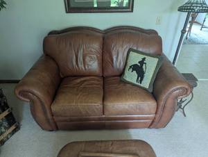 lot 402 image: Leather Love Seat - Tan - 2 Person - 60 x 39 - Elegance with Function
