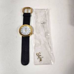 lot 16 image: New BeauticianBarber Watch White Pearl Like Face Gold Hands Quartz Black Leather Band