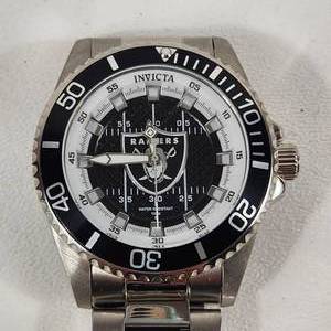 lot 31 image: Mens INVIKTA Wrist Watch NFL Raiders BlackWhite Face Silver Band 36936 Excellent Condition