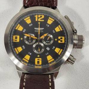 lot 42 image: Mens INVIKTA Wrist Watch Black Face Gold Numbers With Brown Band 2642 Great Condition Needs Battery