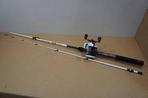 lot 87 image: Ugly Stick Walleye Rod with Shakespeare Line Counter Reel